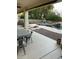 Covered patio overlooking the refreshing pool and spa at 4450 S Rio Dr, Chandler, AZ 85249