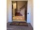 Inviting entryway with tile flooring and staircase leading to upper level at 4450 S Rio Dr, Chandler, AZ 85249