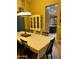 Elegant dining room with a large table and charming hutch at 4450 S Rio Dr, Chandler, AZ 85249