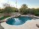 Inviting pool and spa surrounded by lush landscaping at 4450 S Rio Dr, Chandler, AZ 85249
