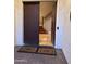 Open double doors to an entryway with a staircase at 4450 S Rio Dr, Chandler, AZ 85249