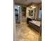 Elegant bathroom featuring a large soaking tub and walk-in closet at 4450 S Rio Dr, Chandler, AZ 85249