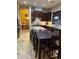 Spacious kitchen with large island, ample cabinetry, and granite countertops at 4450 S Rio Dr, Chandler, AZ 85249