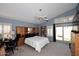 Large bedroom with sliding glass doors leading to a patio at 15626 N 50Th St, Scottsdale, AZ 85254
