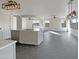 Open kitchen features an island and stainless steel appliances at 2692 W Silver Streak Way, San Tan Valley, AZ 85144