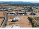 Aerial view showcasing new construction homes and desert landscape at 29408 N 244Th Dr, Wittmann, AZ 85361