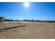 Large vacant lot with desert landscape, potential for building at 29408 N 244Th Dr, Wittmann, AZ 85361