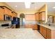 Modern kitchen with granite countertops, stainless steel appliances, and ample cabinetry at 29408 N 244Th Dr, Wittmann, AZ 85361