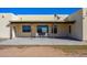 Covered patio with concrete flooring and seating area, ideal for outdoor relaxation at 29408 N 244Th Dr, Wittmann, AZ 85361