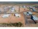 Aerial view of a new construction community, showcasing various home styles at 29408 N 244Th Dr, Wittmann, AZ 85361