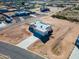 Aerial view of house on a large lot in a desert area at 29408 N 244Th Dr, Wittmann, AZ 85361