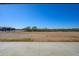 Large vacant lot with desert landscape behind the house at 29408 N 244Th Dr, Wittmann, AZ 85361