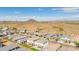 Aerial view of houses and community at 14255 W Honeysuckle Dr, Surprise, AZ 85387