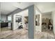 Open living area with exercise bike and fireplace at 11405 S Tawa Ln, Phoenix, AZ 85044