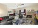 Spacious living room featuring a fireplace and comfortable seating at 11405 S Tawa Ln, Phoenix, AZ 85044