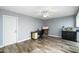 Small home office with desk and wood-look floors at 11405 S Tawa Ln, Phoenix, AZ 85044