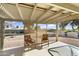 Covered patio with seating, perfect for outdoor relaxation at 11405 S Tawa Ln, Phoenix, AZ 85044
