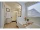 Bathroom with soaking tub, separate shower, and neutral color scheme at 8146 W Hilton Ave, Phoenix, AZ 85043