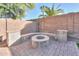 Fire pit with built in seating at 44977 W Miraflores St, Maricopa, AZ 85139