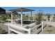 Relaxing picnic area with shaded tables and benches at 32137 N Saddlehorn Dr, San Tan Valley, AZ 85140