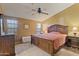 Spacious main bedroom with large bed and plenty of natural light at 2550 S Ellsworth Rd # 215, Mesa, AZ 85209