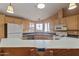 Kitchen with corner sink and ample counter space at 2550 S Ellsworth Rd # 215, Mesa, AZ 85209