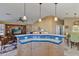 Kitchen features a breakfast bar and is open to the living room at 2550 S Ellsworth Rd # 215, Mesa, AZ 85209