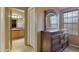 Spacious bedroom with built-in shelves and dresser at 2550 S Ellsworth Rd # 215, Mesa, AZ 85209