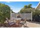 Small patio with table and chairs, perfect for outdoor dining at 2550 S Ellsworth Rd # 215, Mesa, AZ 85209