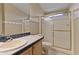 Bathroom with a shower and toilet at 2550 S Ellsworth Rd # 215, Mesa, AZ 85209