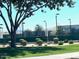 Well-maintained tennis courts with surrounding landscaping at 2550 S Ellsworth Rd # 215, Mesa, AZ 85209