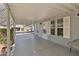 Covered patio entrance with a view of the street and neighborhood at 2550 S Ellsworth Rd # 215, Mesa, AZ 85209