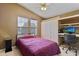 Bedroom with desk and large windows at 2550 S Ellsworth Rd # 215, Mesa, AZ 85209