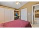 Bedroom with built-in desk and access to kitchen at 2550 S Ellsworth Rd # 215, Mesa, AZ 85209
