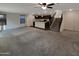 Spacious living area with open concept kitchen at 16259 W La Ventilla Way, Goodyear, AZ 85338