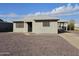 Ranch style home with gravel landscaping and security bars on windows at 4622 S 21St St, Phoenix, AZ 85040