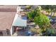 Aerial view of a house with a backyard patio and surrounding landscape at 19824 N 14 Pln, Phoenix, AZ 85024