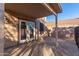 Covered patio with access to backyard and pool at 8143 E Obispo Ave, Mesa, AZ 85212