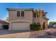 Two-story house with a large garage and well-manicured landscaping at 8143 E Obispo Ave, Mesa, AZ 85212