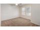 Bedroom with shiplap wall and ceiling fan at 8143 E Obispo Ave, Mesa, AZ 85212