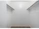 Spacious closet with double hanging rods at 8143 E Obispo Ave, Mesa, AZ 85212