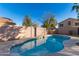 Inviting kidney-shaped pool in sunny backyard at 8143 E Obispo Ave, Mesa, AZ 85212