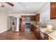 Kitchen with stainless steel appliances and wood cabinets at 8143 E Obispo Ave, Mesa, AZ 85212
