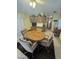Cozy dining area with table and chairs, adjacent to kitchen at 1541 W Yurok Ave, Apache Junction, AZ 85119