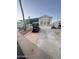 Mobile home exterior with carport and landscaping at 1541 W Yurok Ave, Apache Junction, AZ 85119