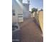 Small backyard with gravel and a patio area at 1541 W Yurok Ave, Apache Junction, AZ 85119