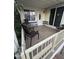 Covered patio with table and chairs, ideal for relaxing at 1541 W Yurok Ave, Apache Junction, AZ 85119