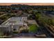 Aerial view showcasing home, backyard, and surrounding neighborhood at 6520 N 130Th Ln, Glendale, AZ 85307