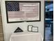 Wall display featuring a Flag of Honor and related mementos at 16240 N 33Rd Way, Phoenix, AZ 85032