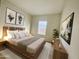 Bedroom with a modern bed, neutral tones, and wood accents at 16240 N 33Rd Way, Phoenix, AZ 85032